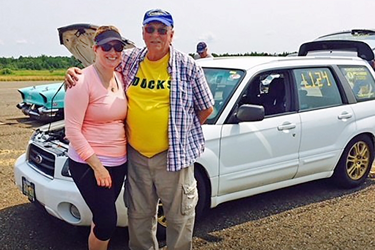 Daughter, Lori, and Bill with the 2005 Forester in 2013.