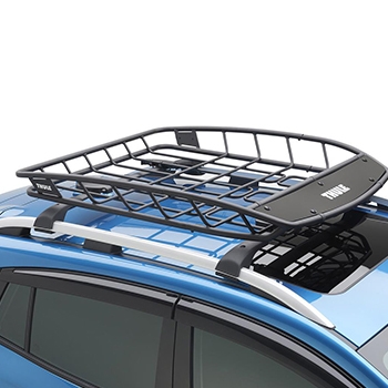 Thule® Heavy-Duty Roof Cargo Basket on top of a blue SUV