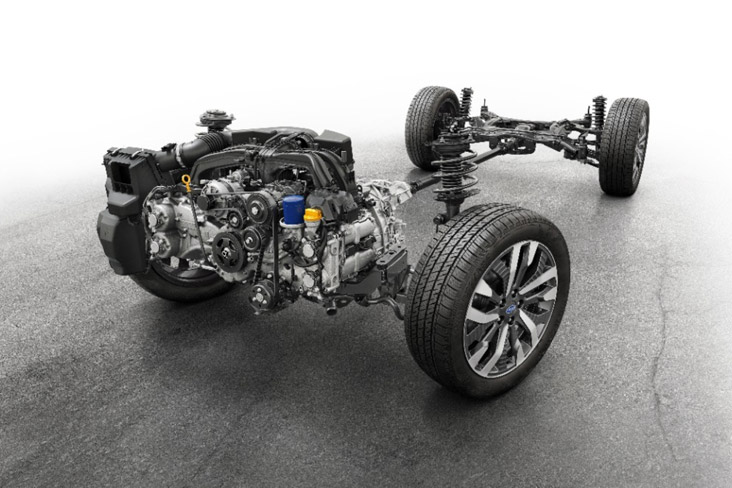 Front 3/4 view of 2025 Forester drivetrain parked on asphalt surface in studio environment.