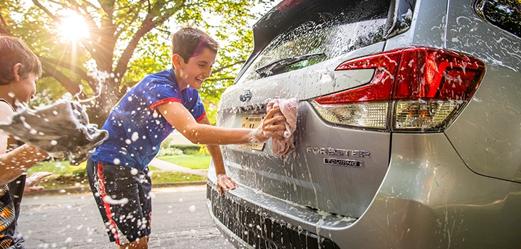 Saul, 13, and Theo, 8, show their appreciation for a week with “Subie.”