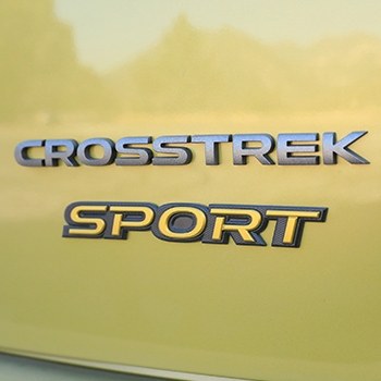 close shot of 2021 Crosstrek Sport logos on exterior