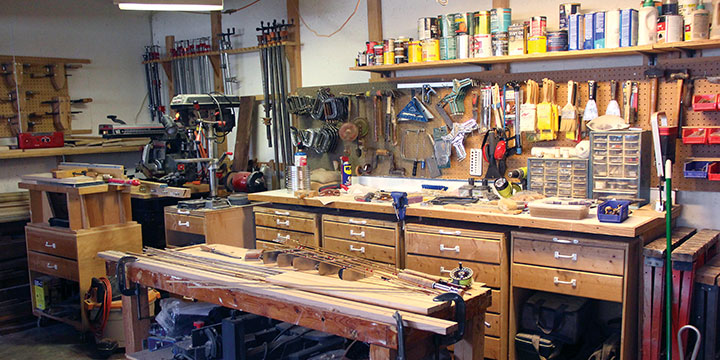 Ronald Cuny crafts his bamboo fishing rods in his workshop.