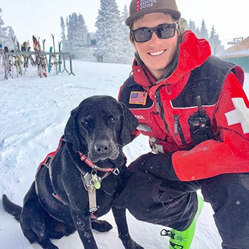 Ambassador Drew Warkentin with one of his rescue dog