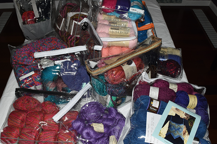 knitting materials and yarn laying on a table