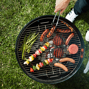 Beyond Meat®. burgers on a grill