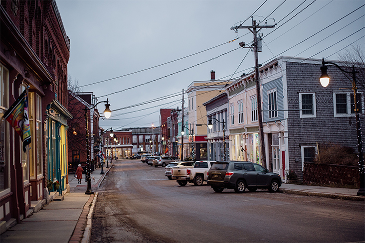 A quaint store-lined street in downtown Eastport, Maine, at dusk 