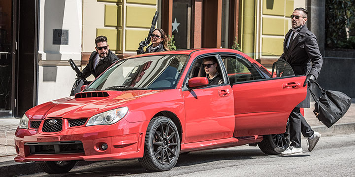 A scene from Baby Driver with stars Jon Bernthal, Eiza Gonzalez, Ansel Elgort and Jon Hamm.