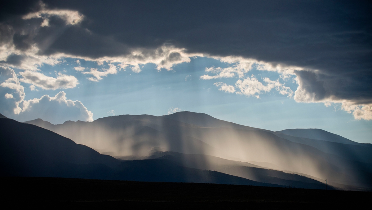 Sangre de Cristo mountains with rain and clouds