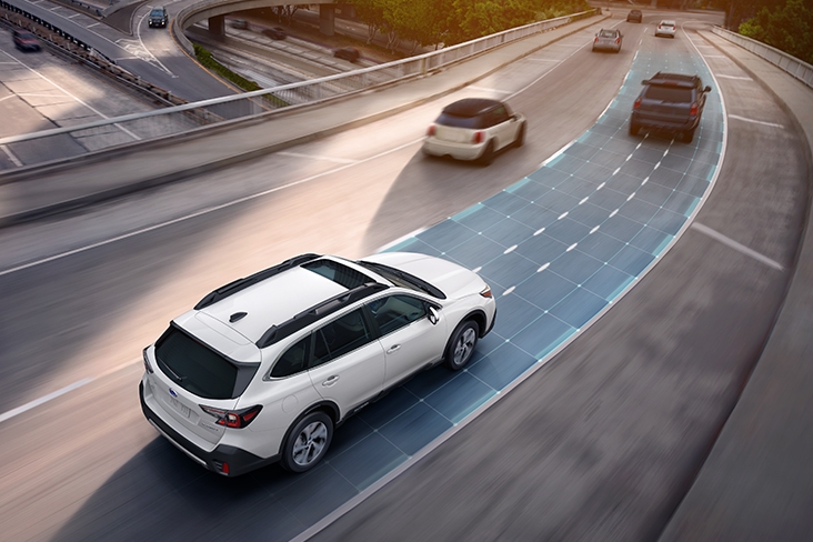 Lane Departure and Sway Warning, shown on a 2021 Subaru Outback on a highway.