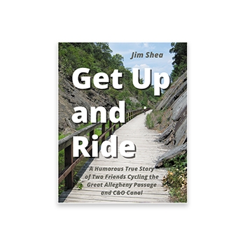 The cover of Get Up and Ride, showing a wooden-planked trail in a lush canyon area.