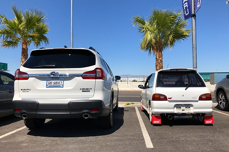 The Vivio RX-R parked next to a Subaru Ascent for size comparison; the Ascent makes the Vivio RX-R look extra compact in this view.