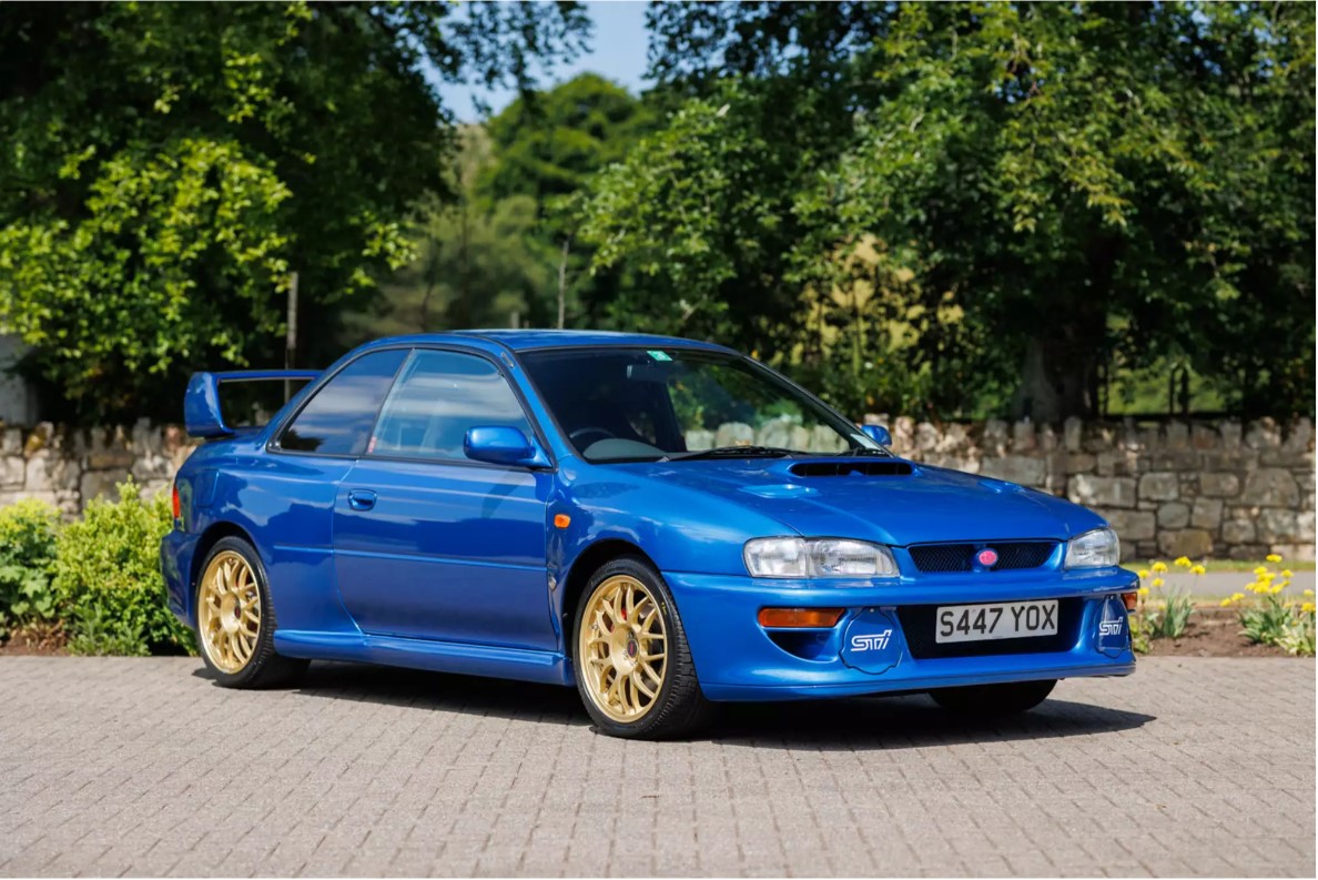 Full-body exterior shot of the Ex-Colin McRae 1998 Subaru Impreza 22B STi