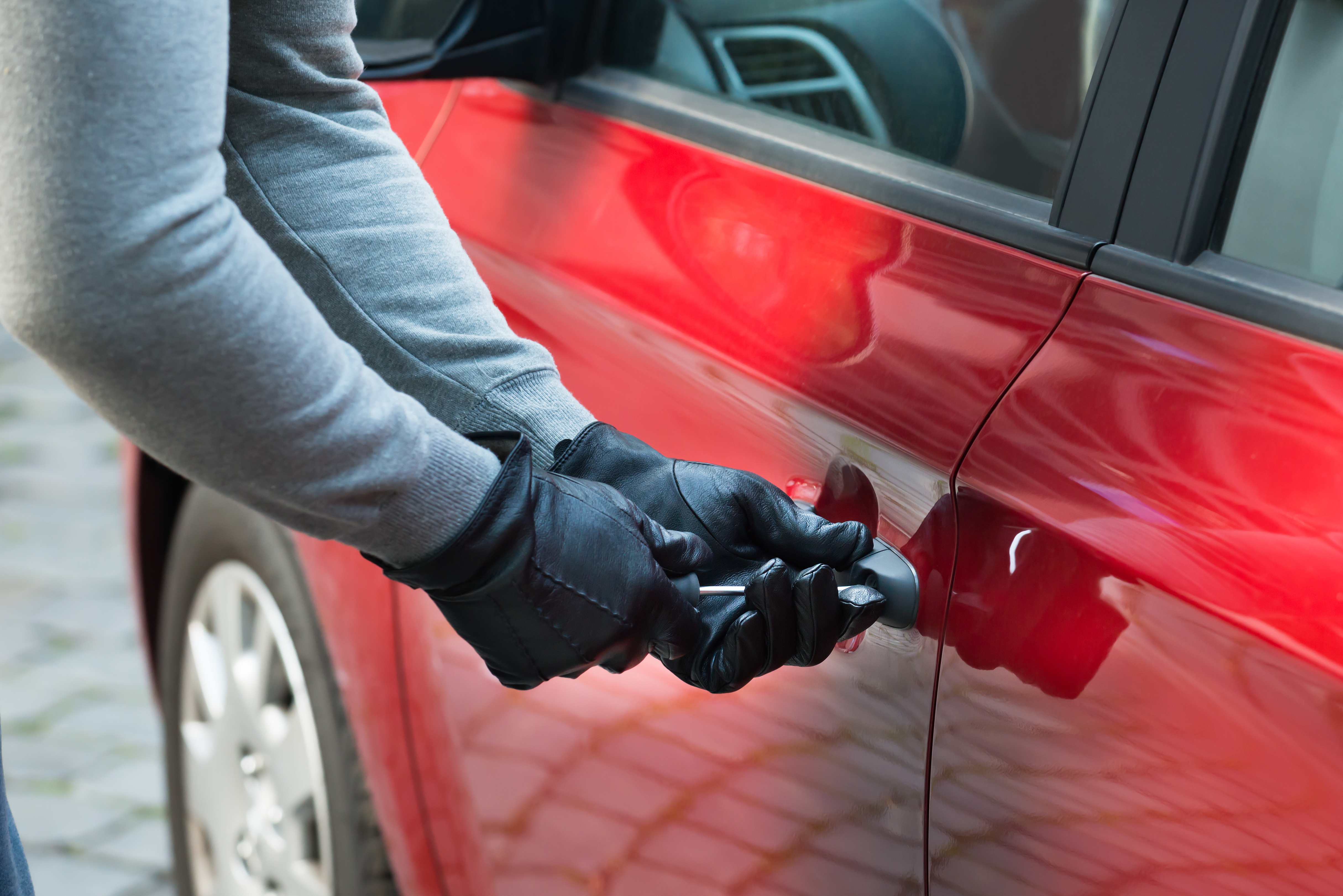 Close-up,Photo,Of,Thief,Opening,Car’s,Door