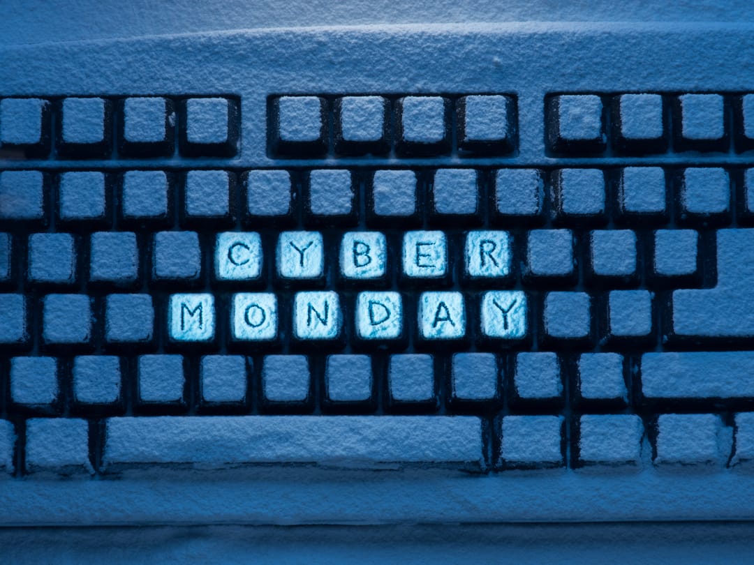 Computer,Keyboard,With,Words,Cyber,Monday,Illuminated,With,Blue,Light