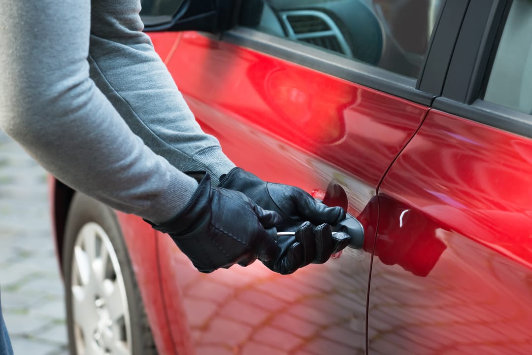 Close-up,Photo,Of,Thief,Opening,Car’s,Door