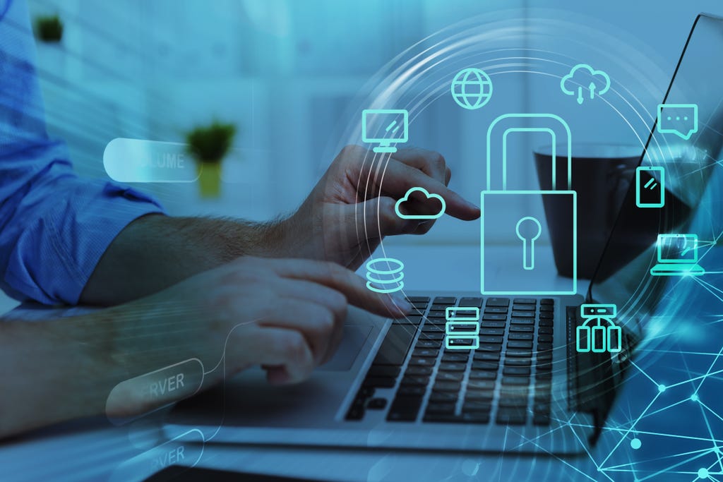 Businesswoman,With,Laptop,,Desktop,At,Office,Interior,,Blue,Glowing,Information Businesswoman,With,Laptop,,Desktop,At,Office,Interior,,Blue,Glowing,Information