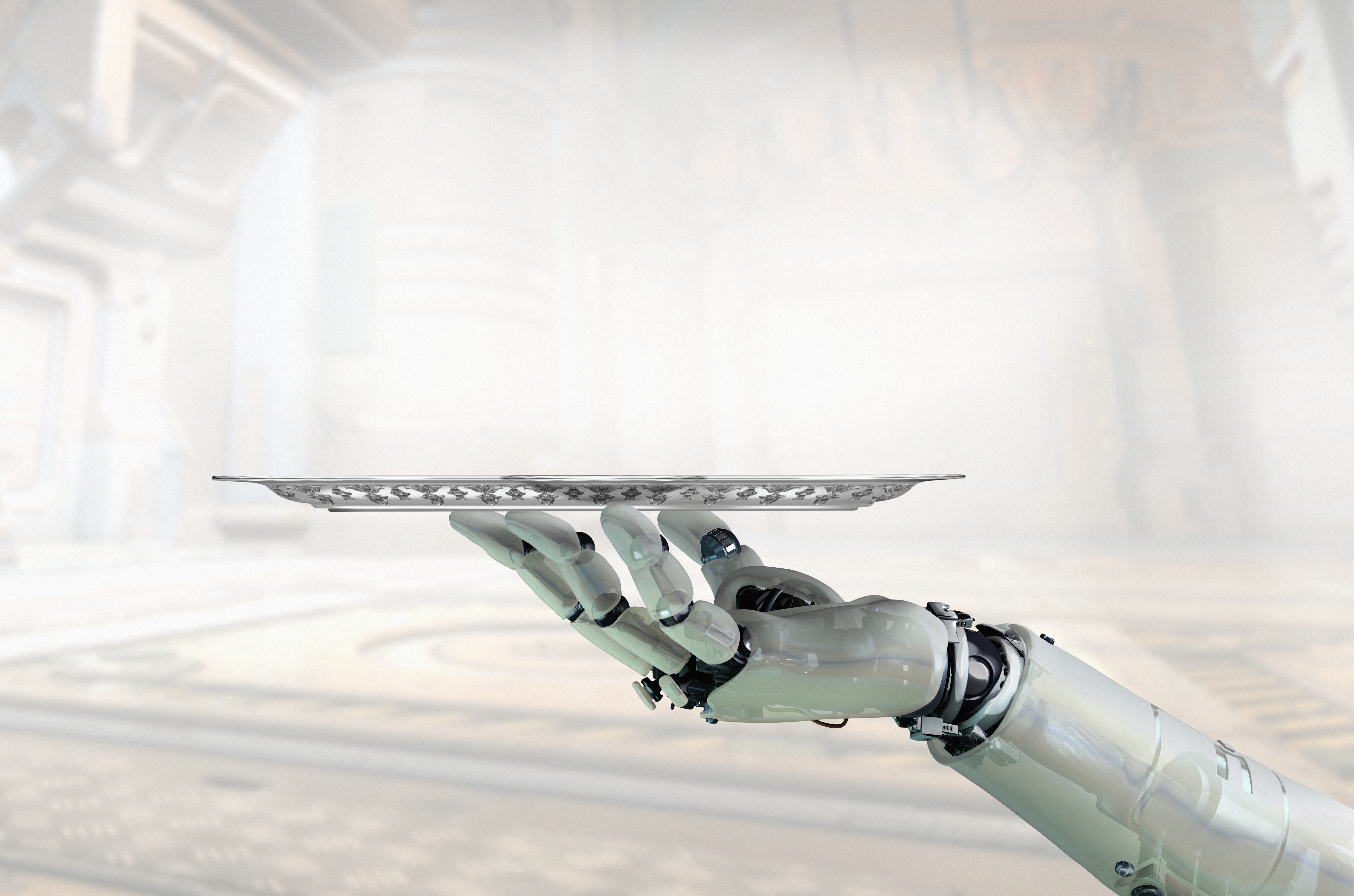A silver-white robot hand holding a silver tray on its fingertips, against a blurred background of a large room