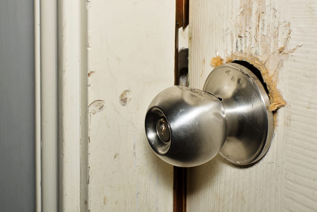 Broken,Modern,Doorknob,Closeup,With,Signs,Of,Forced,Entry,,Criminal Broken,Modern,Doorknob,Closeup,With,Signs,Of,Forced,Entry,,Criminal