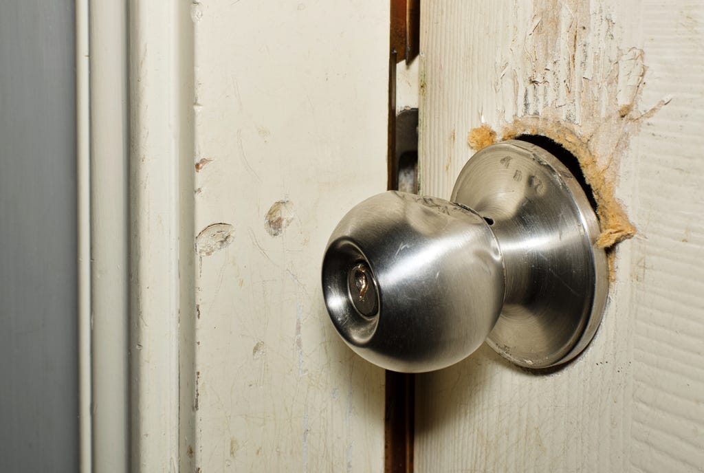 Broken,Modern,Doorknob,Closeup,With,Signs,Of,Forced,Entry,,Criminal Broken,Modern,Doorknob,Closeup,With,Signs,Of,Forced,Entry,,Criminal