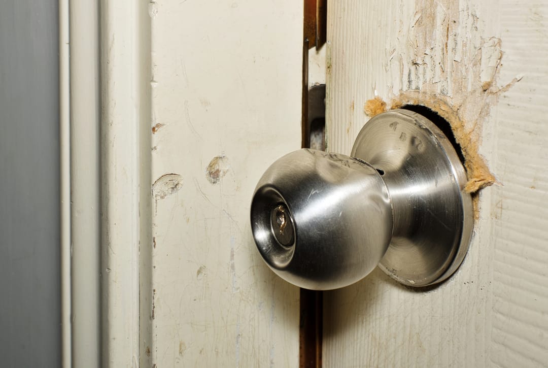 Broken,Modern,Doorknob,Closeup,With,Signs,Of,Forced,Entry,,Criminal