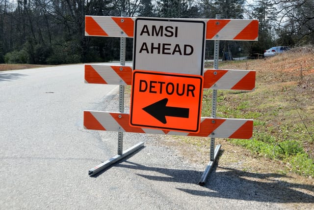 Altered detour sign Altered detour sign