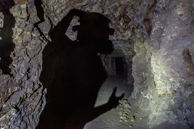 Shadow of a person in an underground mine Shadow of a person in an underground mine