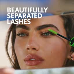 CoverGirl Clump Crusher Water Resistant Mascara with green wand and brush