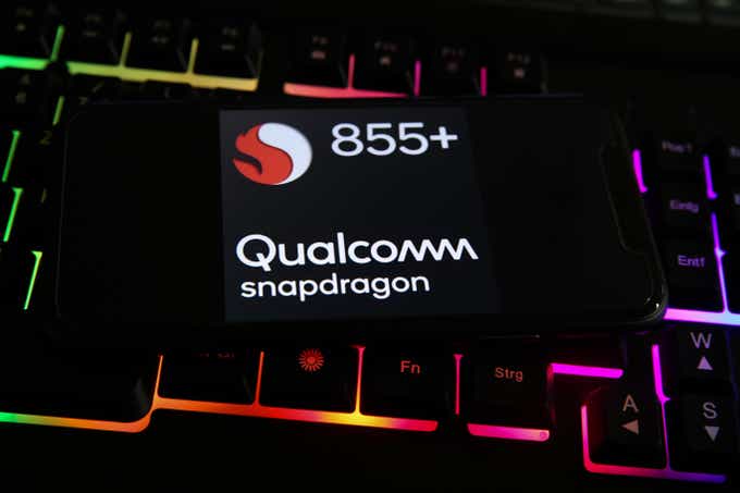 Qualcomm Snap Dragon logo with lighted wireless technology backdrop