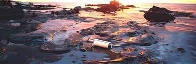 message in a bottle in an oil spill