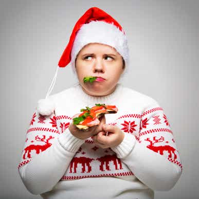 kid eating sketchy Christmas sandwich