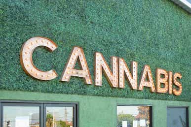 Cannabis Sign on Building - 10 Best Cannabis Stocks to Watch in 2022