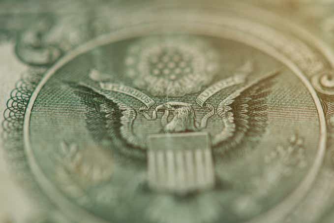 Hawk on one dollar bill close up view