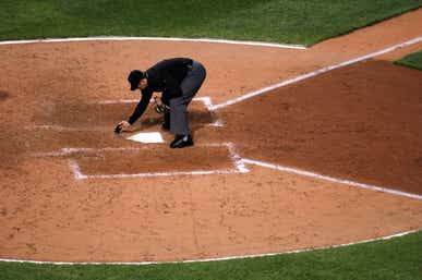 umpire dusting off home place