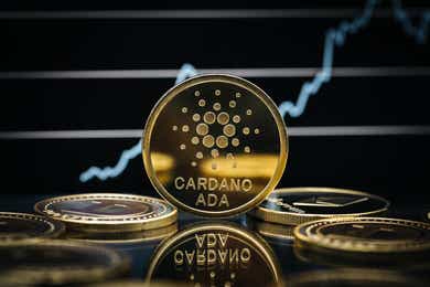 Cardano Coins with Chart in Background