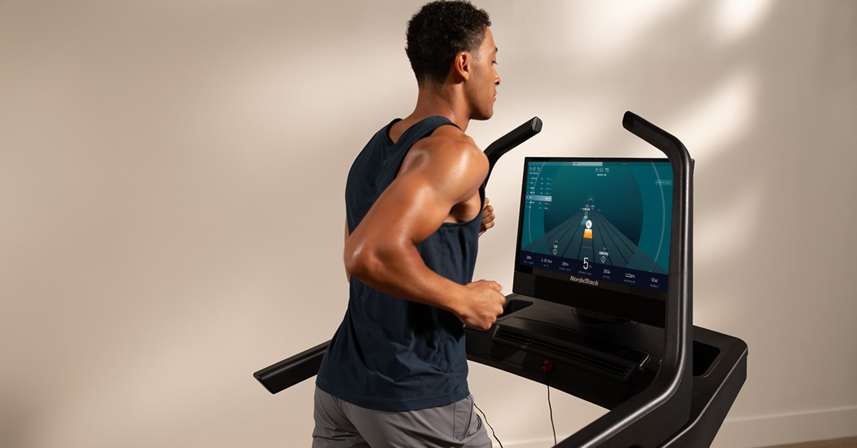 Runner using a NordicTrack treadmill during an iFIT Ergatta Spring Cup race