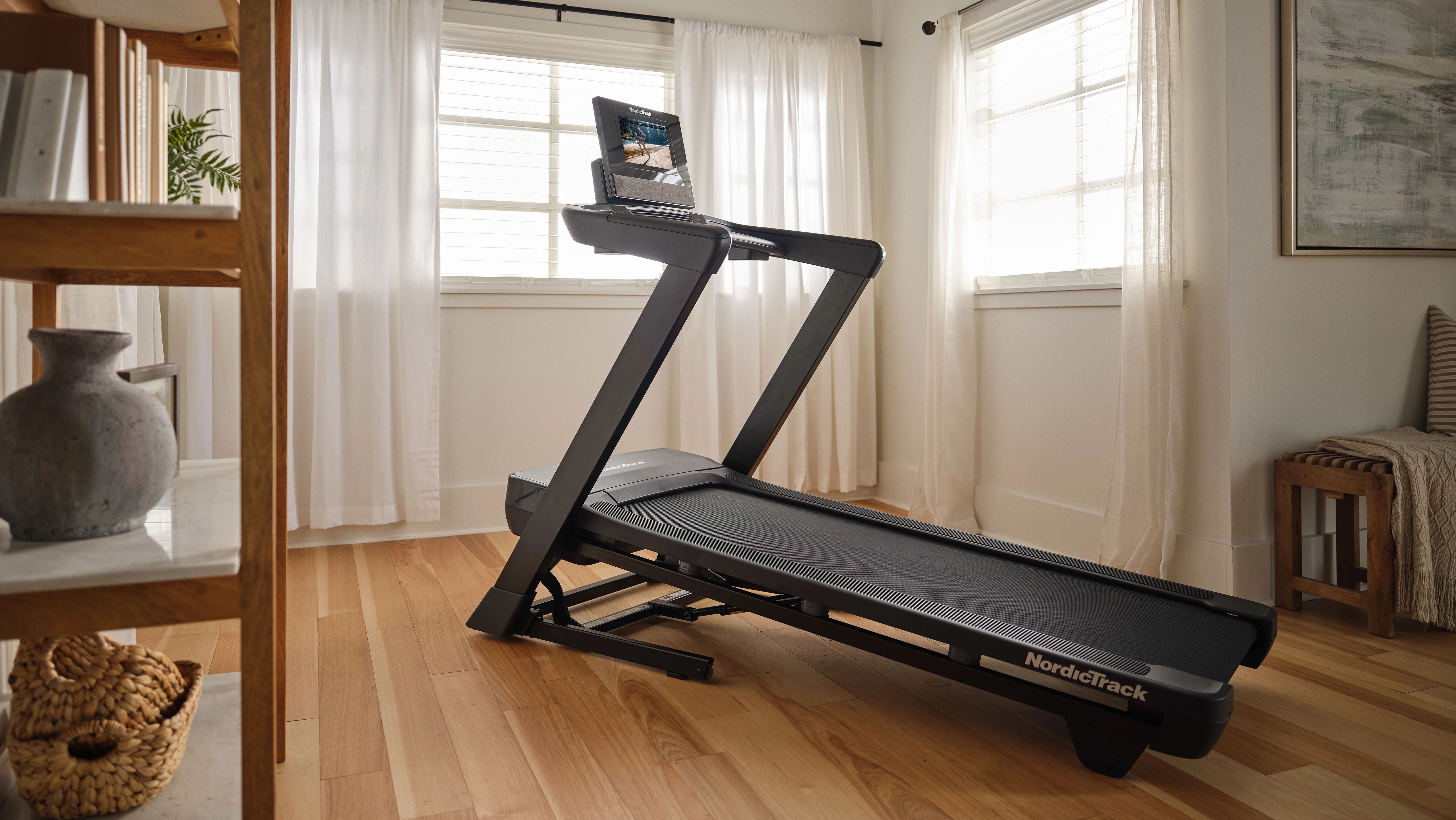 Best NordicTrack treadmill for apartments with foldable design in a modern home setup
