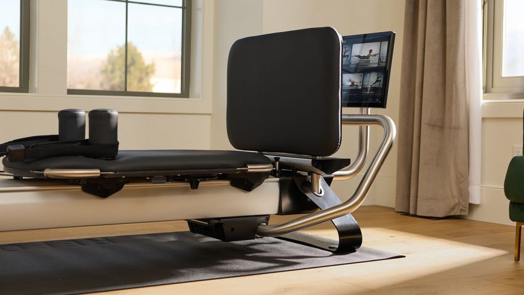 NordicTrack Ultra 1 Reform RX-S positioned in a living space, showcasing studio-quality Pilates equipment for home use.