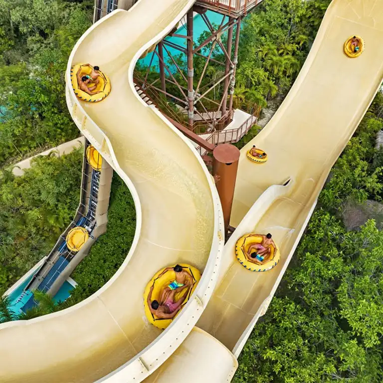Aerial view of the Beachside Boomerango slide at Jungala Aqua Experience, showing its full path