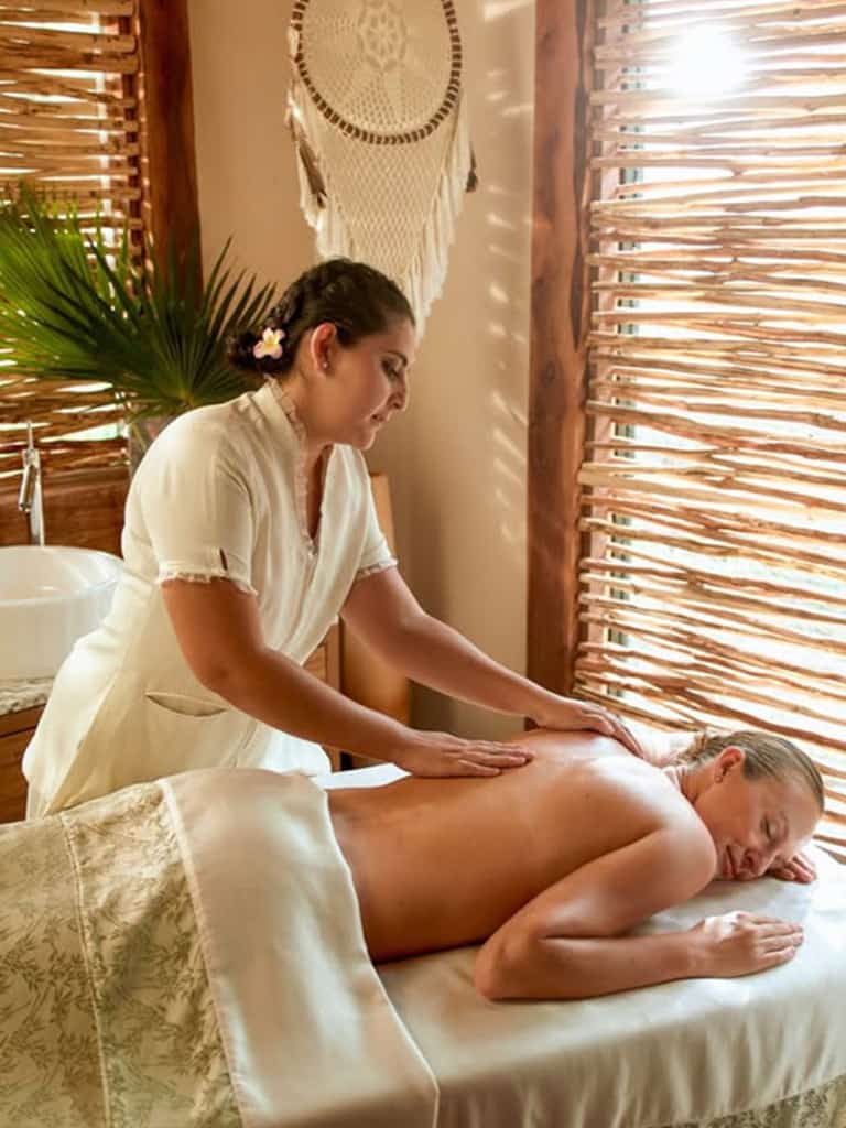 Massage treatment at the Kuxtal spa in Jungala Aqua Experience with tropical decor