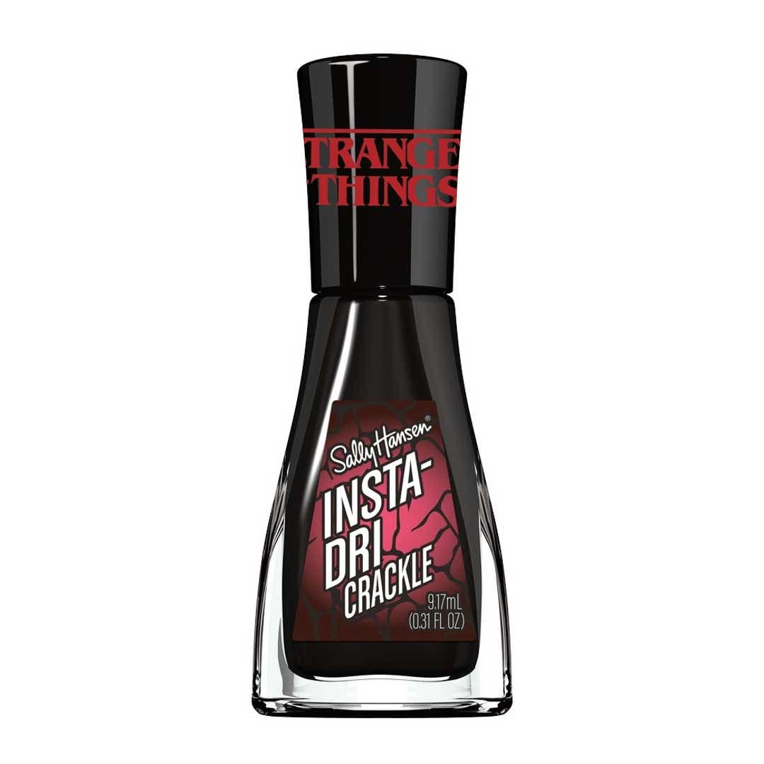 Bottle of Sally Hansen Insta-Dri Crackle nail polish featuring a black cap with "Stranger Things" logo on top. - Image 1 of 4