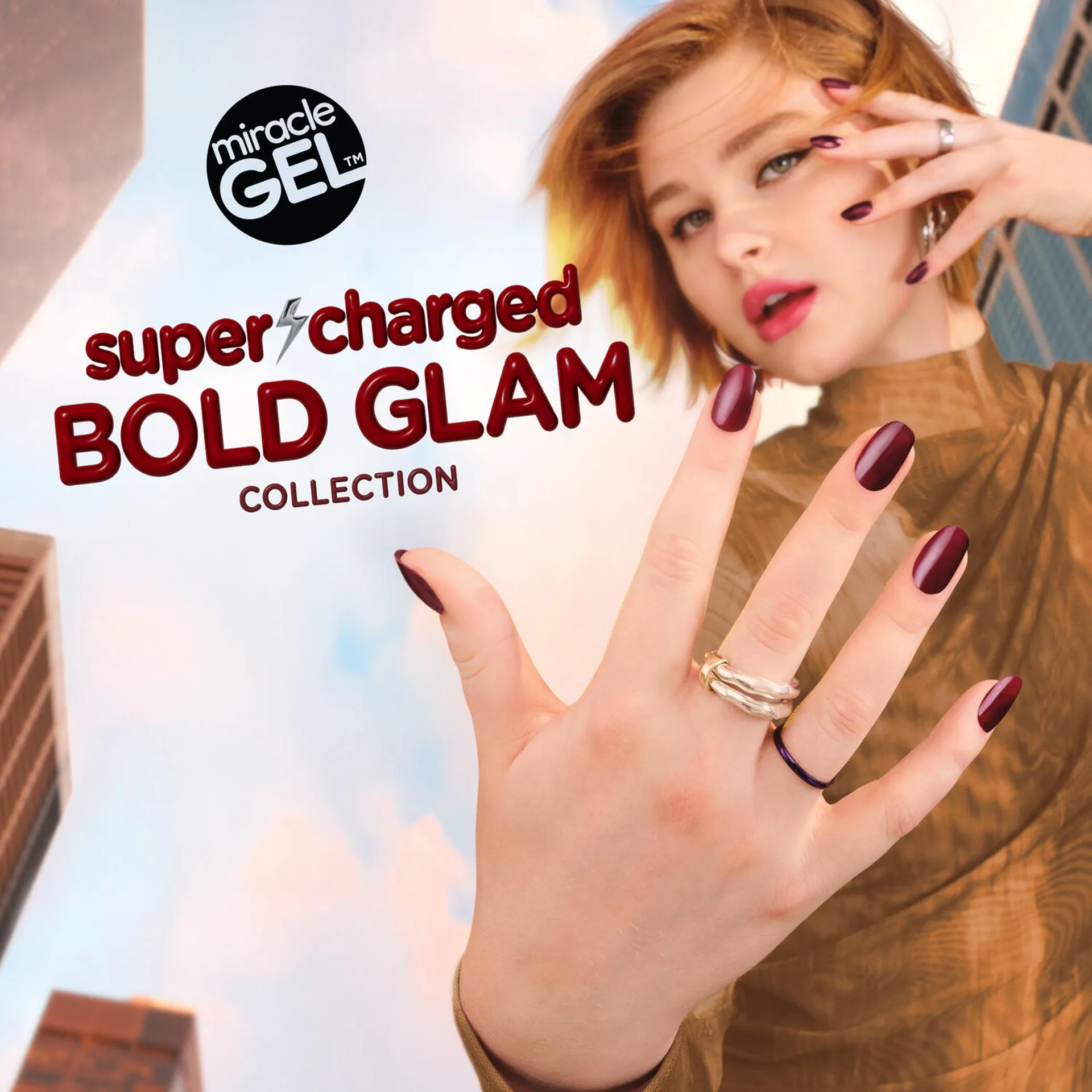Close-up of a model's hand showcasing freshly painted nails with Sally Hansen Miracle Gel Supercharged Bold Glam nail polish