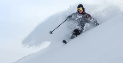 athlete-skiing-powder-snow.jpg