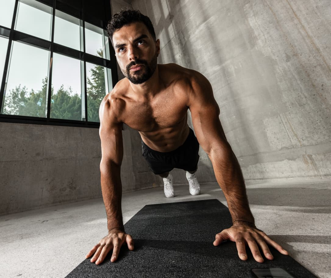 muscular-athlete-pushups-bodyweight-strength.jpg