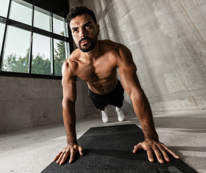 muscular-athlete-pushups-bodyweight-strength.jpg