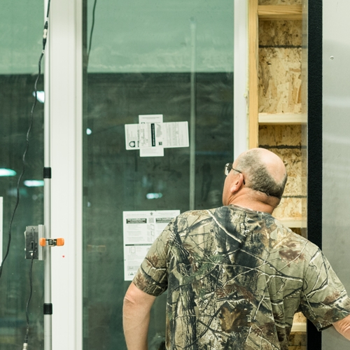 a duratherm employee testing a completed window