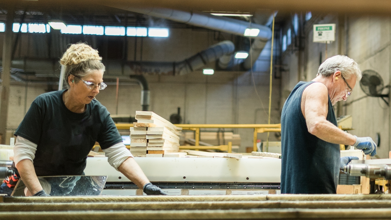 two people working at Duratherm on a custom product