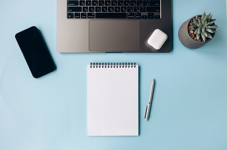 Office items neatly arranged on surface.