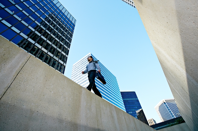 Low angle view of person on sidewalk.