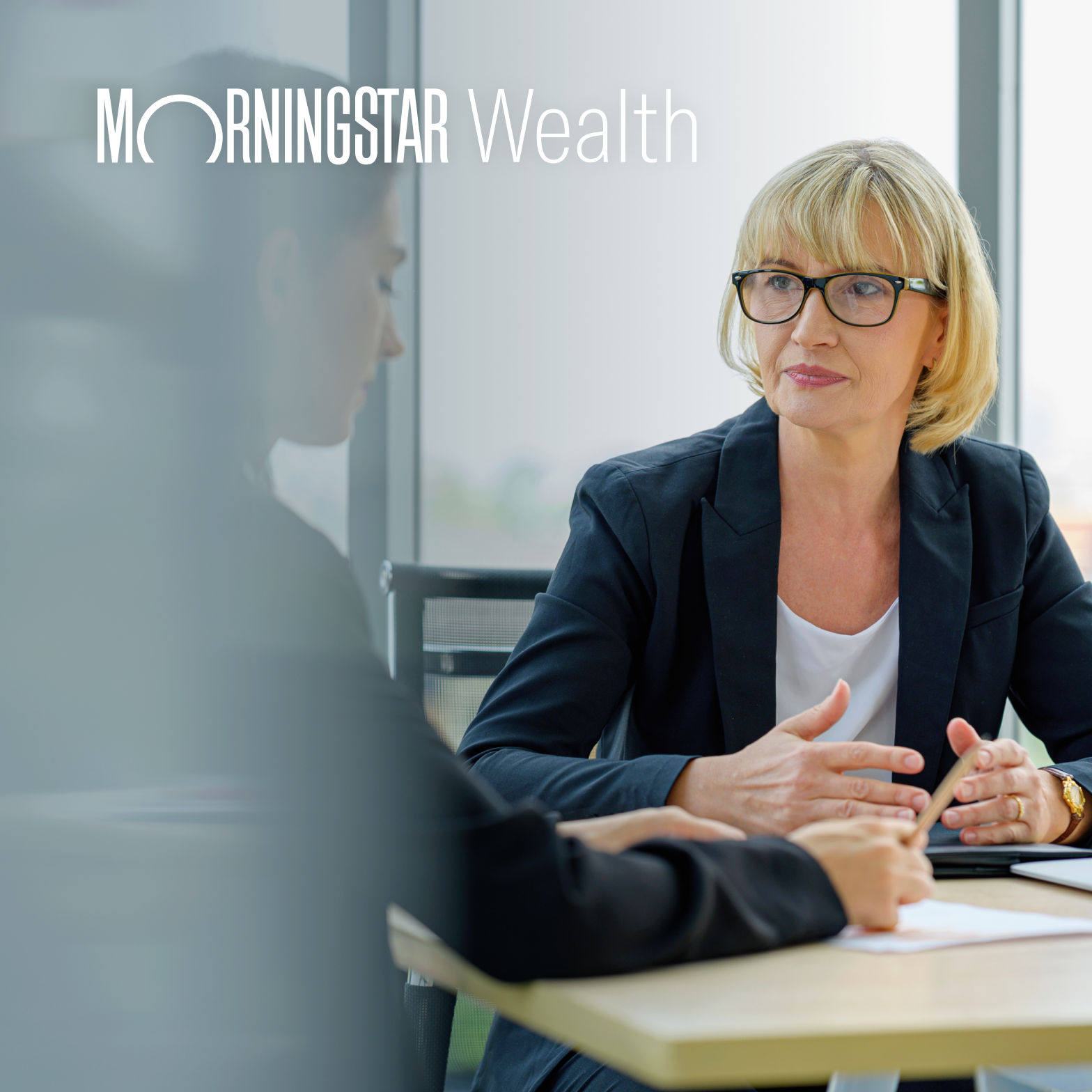 Legible white lockup on light photograph with gradient overlay.