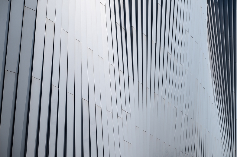Metallic building cladding.